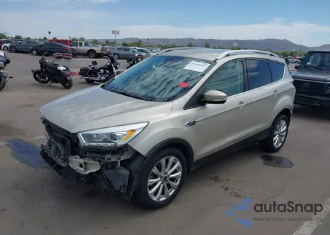2017 Ford Escape Titanium z USA, uszkodzony, nr VIN 1FMCU0JD7HUD84006